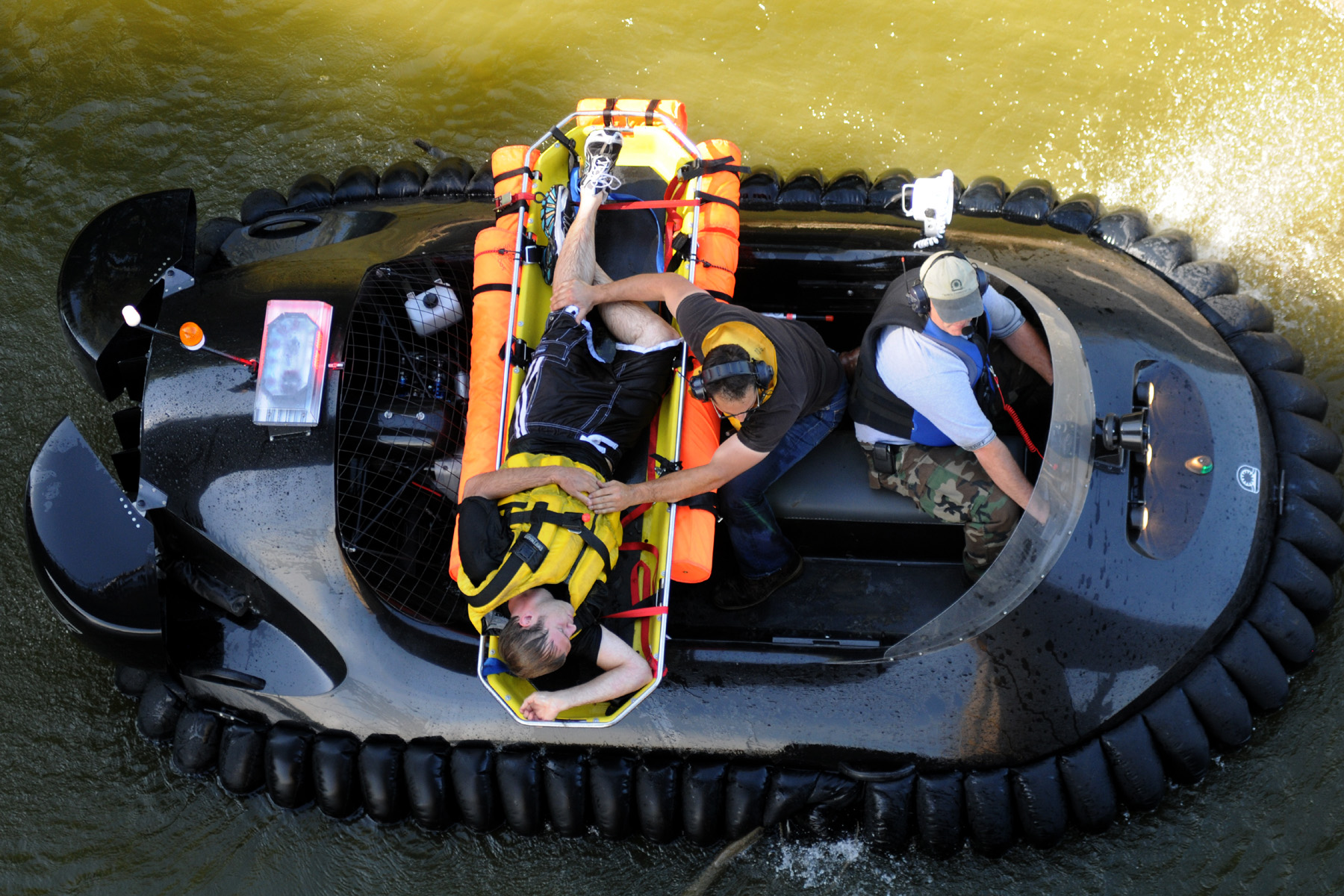 The victim now in the stretcher basket, an optional part for all Neoteric rescue Hovertrek™.